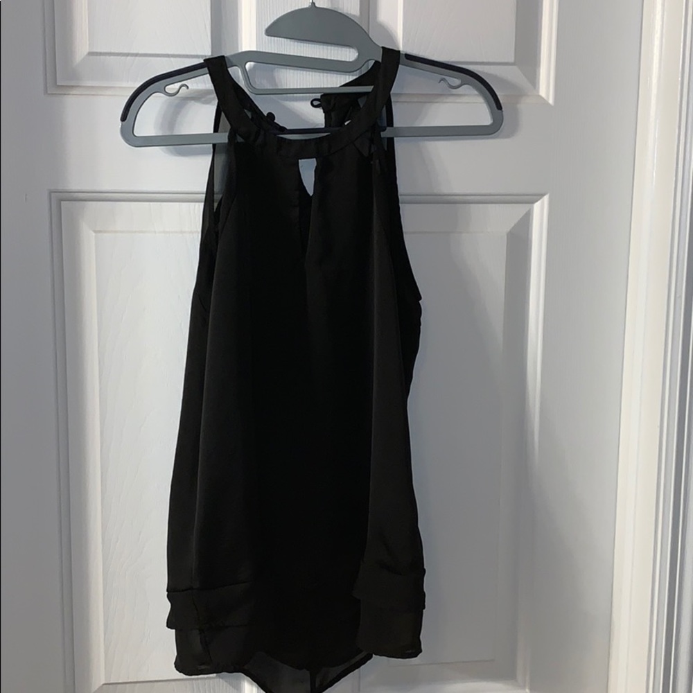 Black sleeveless blouse